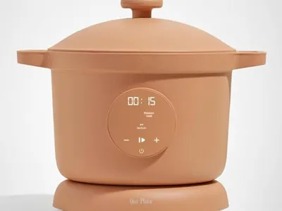 Our Place Dream Cooker in terracotta featuring a digital touchscreen display, perfect for meal prep, slow cooking, postpartum freezer meals, soups, and family-friendly recipes.