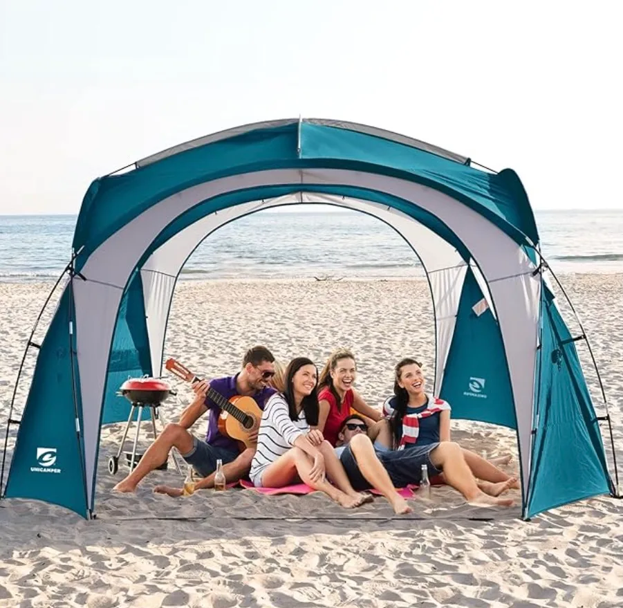 Large portable beach shade canopy with UPF sun protection, providing shade for families during beach trips, picnics, and outdoor activities.