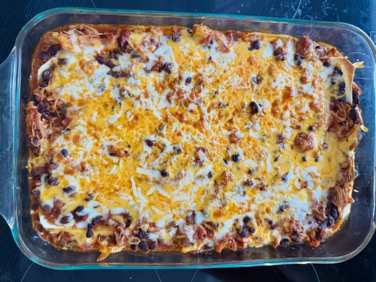 High protein chicken enchilada bake with melted cheese