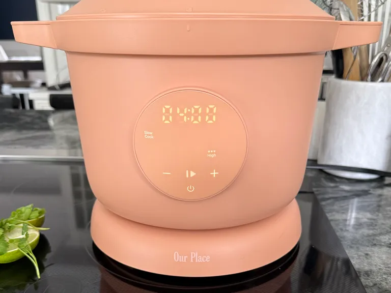 Our Place Dream Cooker slow cooking high-protein white chicken chili, a hands-off meal prep recipe perfect for postpartum freezer meals and healthy family dinners.